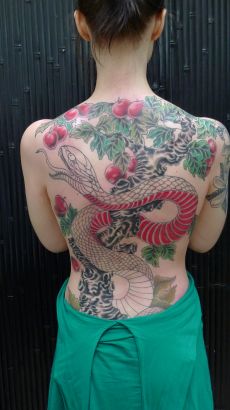 Snake Tats On Girl's Back. 